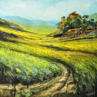 Vibrant landscape oil painting titled Blooming Grassland featuring a rustic cottage nestled in rolling green and yellow fields with a winding dirt path under a blue sky.