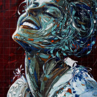 Abstract expressionist portrait painting titled The Radiant Spirit, featuring a joyful woman smiling with head tilted up, painted in vibrant blue, teal, and white brushstrokes against a deep red textured background.
